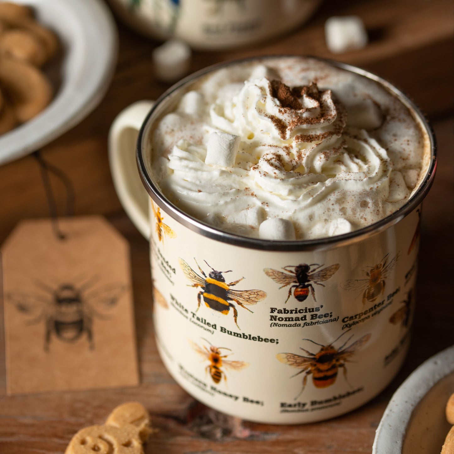 enamel mug decorated with various bee species and their Latin names