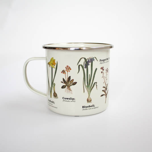 eye level shot of wild flower enamel mug white background