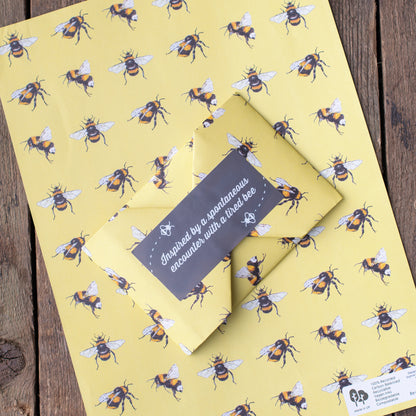100 percent recycled yellow bee gift wrap