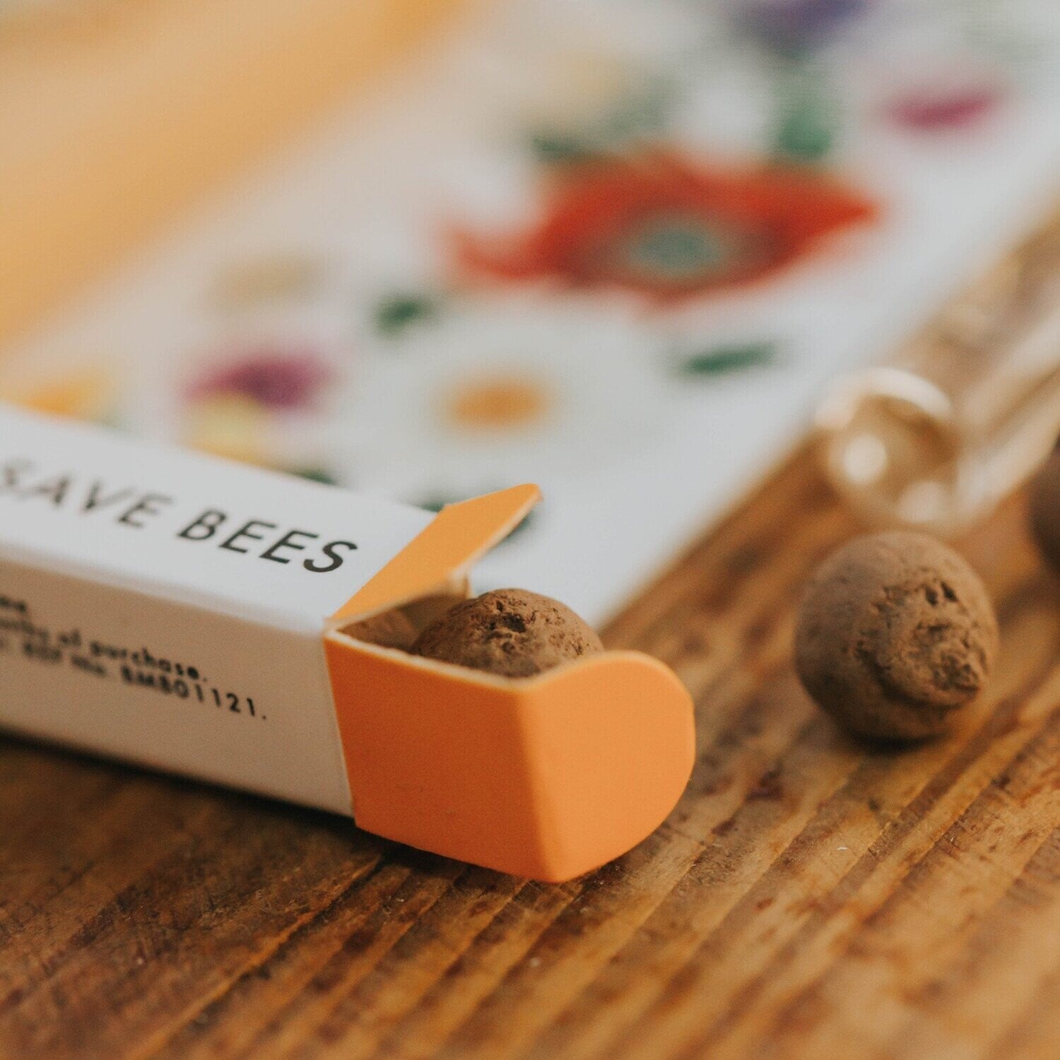 close up of the packaging showing where the seedballs are stored