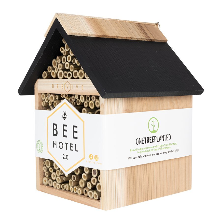 side angle image of bee hotel 2.0 showing onetreeplanted info on cardboard sleeve available from beevive.com